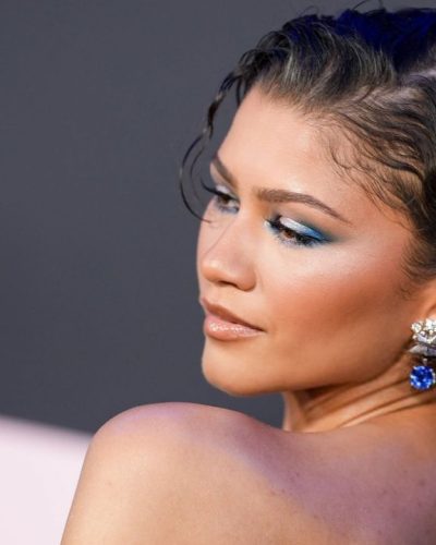 Zendaya flaunting a blue and black strapless dress design