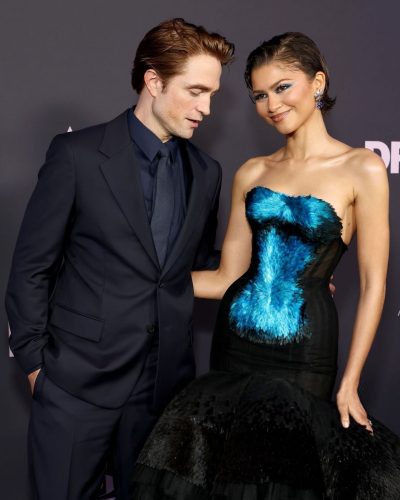 Zendaya in a blue strapless gown with a black skirt