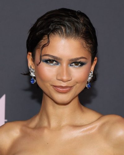 Zendaya in a strapless blue dress with dramatic black accents