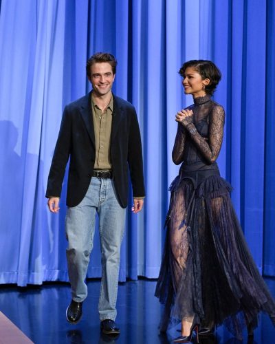 Zendaya in a navy gown paired with classic black heels