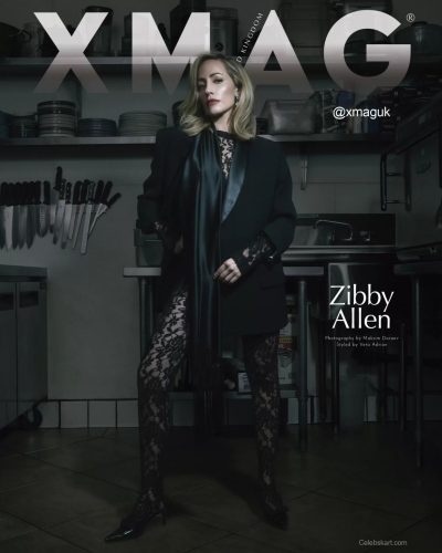 Zibby Allen styled in black satin scarf and tailored blazer.