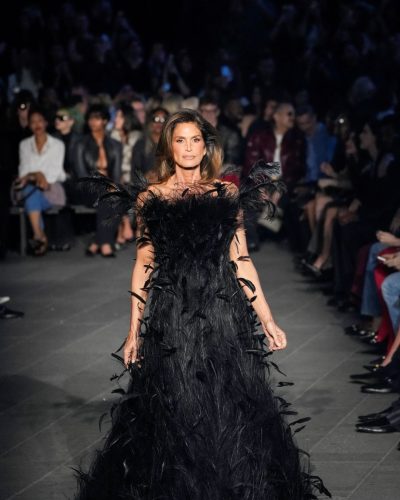 Cindy Crawford Dazzles In Black Feathers At Gucci Cruise 2027 Fashion Show