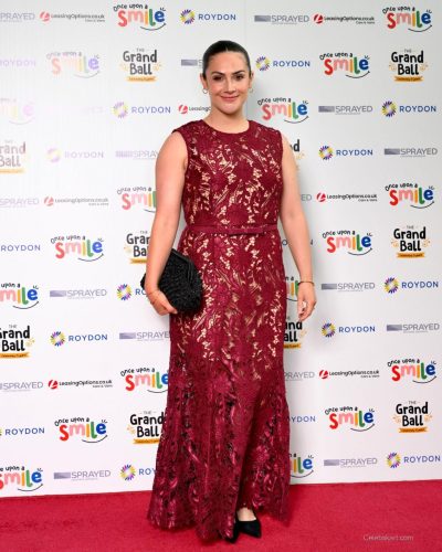 Isabel Hodgins Dazzles In Elegant Burgundy At Once Upon A Smile Grand Ball 2026