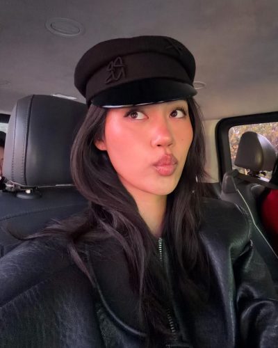 Jihoon Kim’s Stylish Black Ensemble And Playful Hat In May 2026