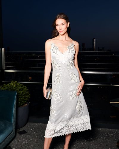 Karlie Kloss Dazzles In Elegant Silver Dress At UTA Pre-Met Gala Soiree 2026