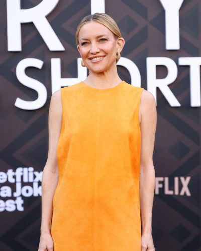 Kate Hudson Dazzles In Vibrant Orange Dress At Marty Premiere 2026