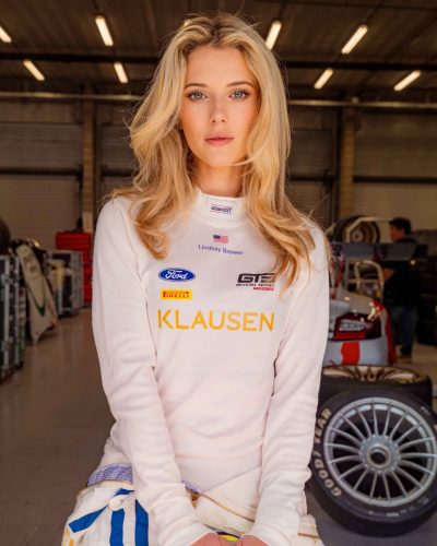 Lindsay Brewer Rocks A Stylish Racing Look At The Garage In May 2026